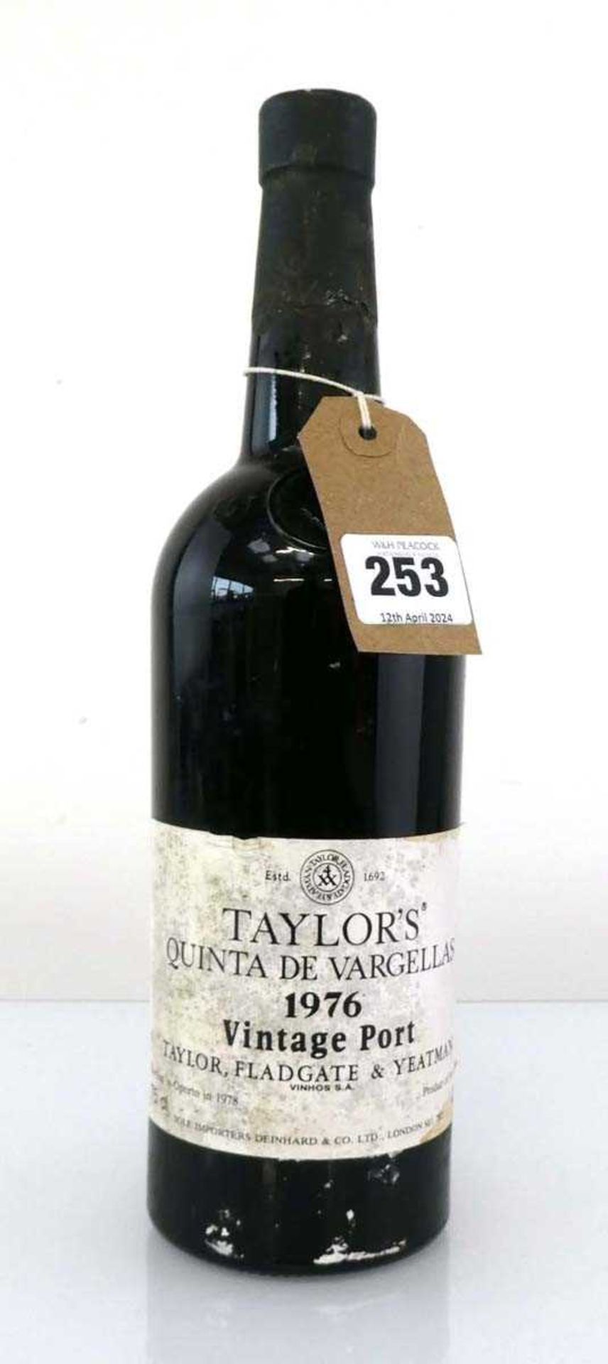 A bottle of Taylor Fladgate & Yeatman Taylor's Quinta De Vargellas 1976 Vintage Port (ullage top