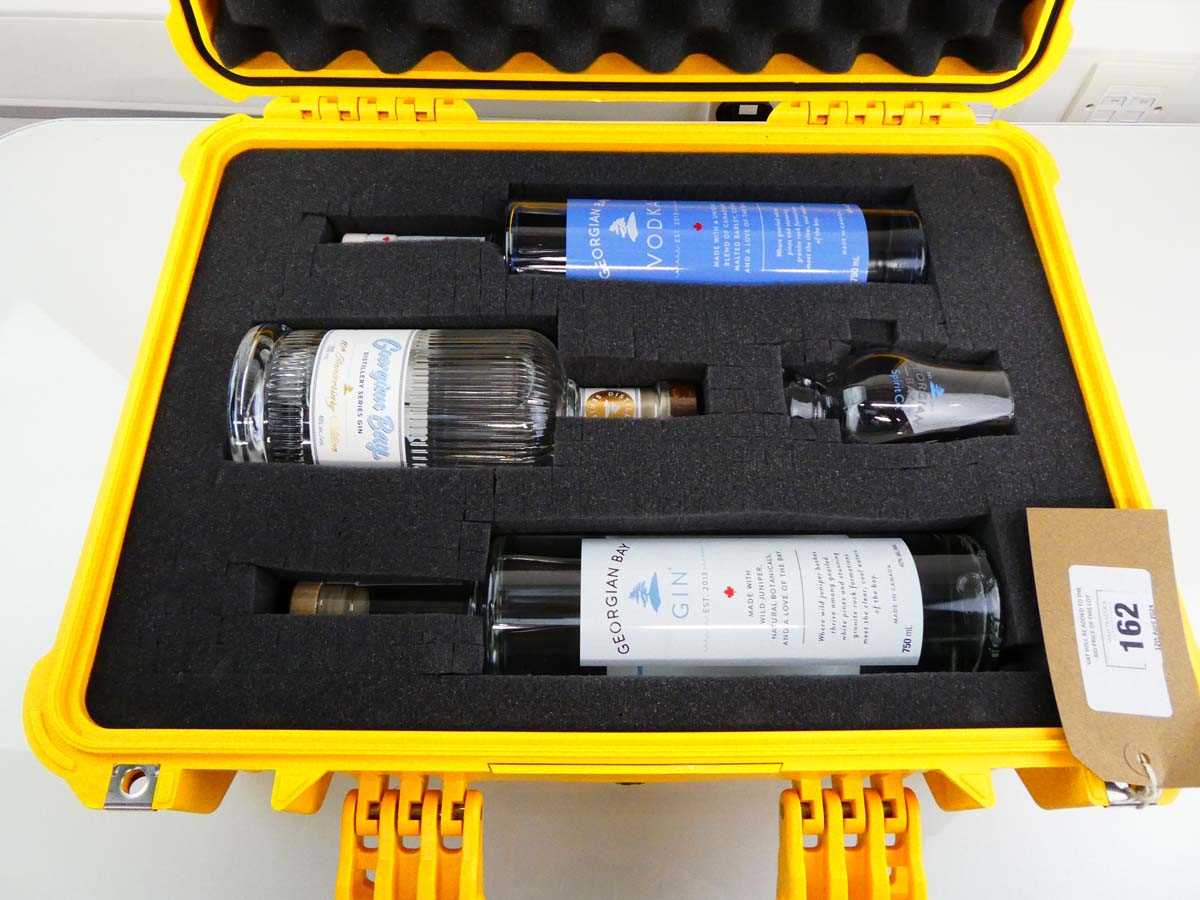 +VAT A Pelican 1520 padded environment proof case with 3 bottles of Georgian Bay Canadian