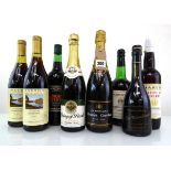 A mixed lot of 8 bottles, 1x Charles Courbet Speciale Cuvee Brut Champagne, 1x Alter Weinbrand