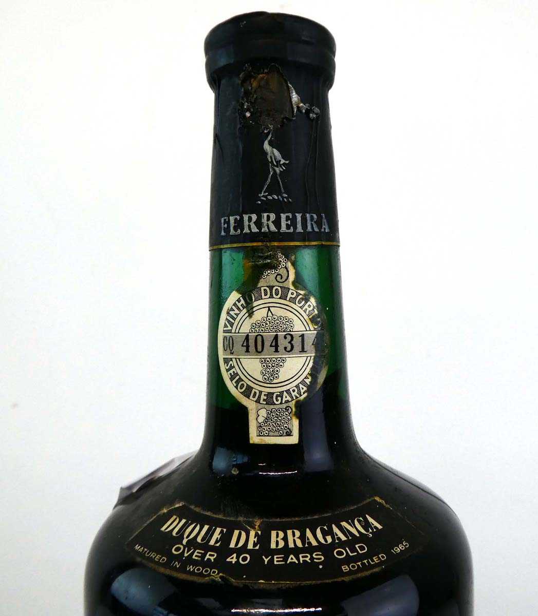 A bottle of Ferreira Duque De Braganca Over 40 years old Port matured in wood bottled 1965 Est. 75cl - Image 2 of 3