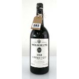 A bottle of Warre's 1980 Vintage Port (ullage top shoulder)