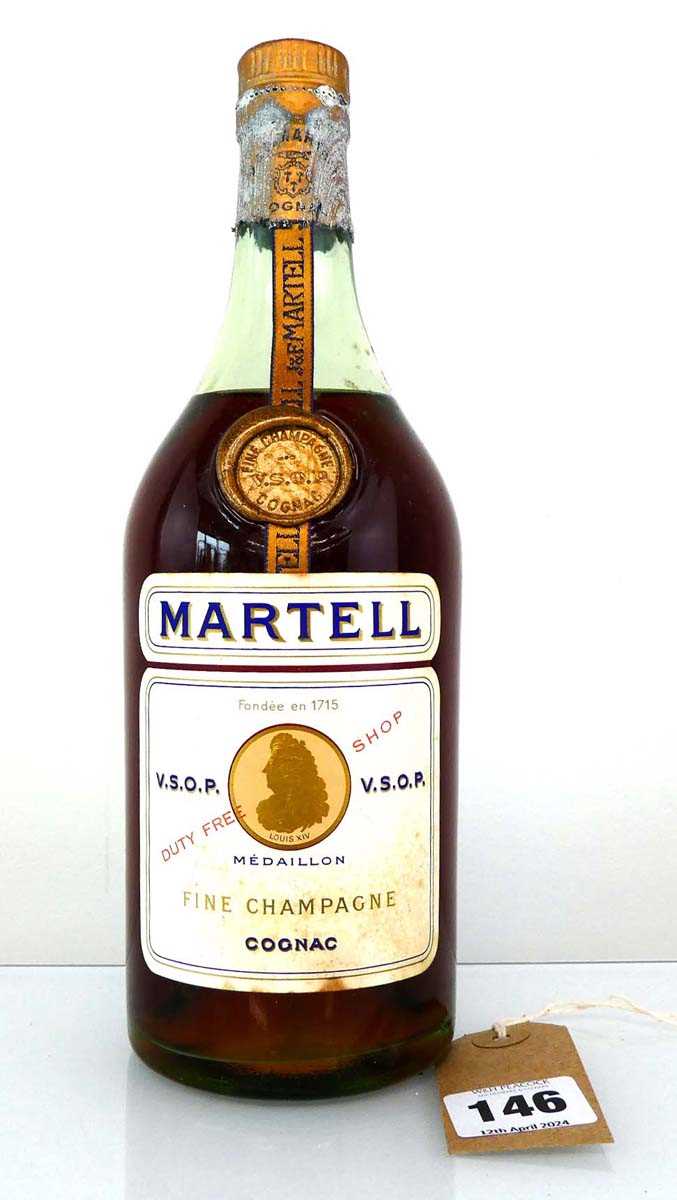 An old bottle of J & F Martell V.S.O.P Medaillon Fine Champagne Cognac circa 1950/1960s Duty Free