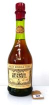 An old bottle of Distillerie Busnel Vieille Reserve V.S.O.P. Calvados du Pays d'Auge 40% 70cl