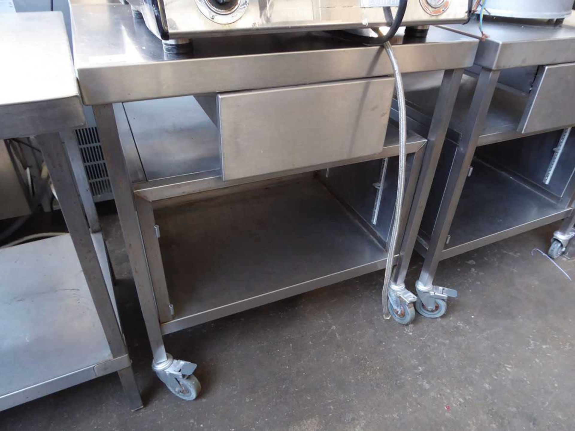 +VAT 79cm stainless steel heavy duty mobile table with a shelf and drawer under