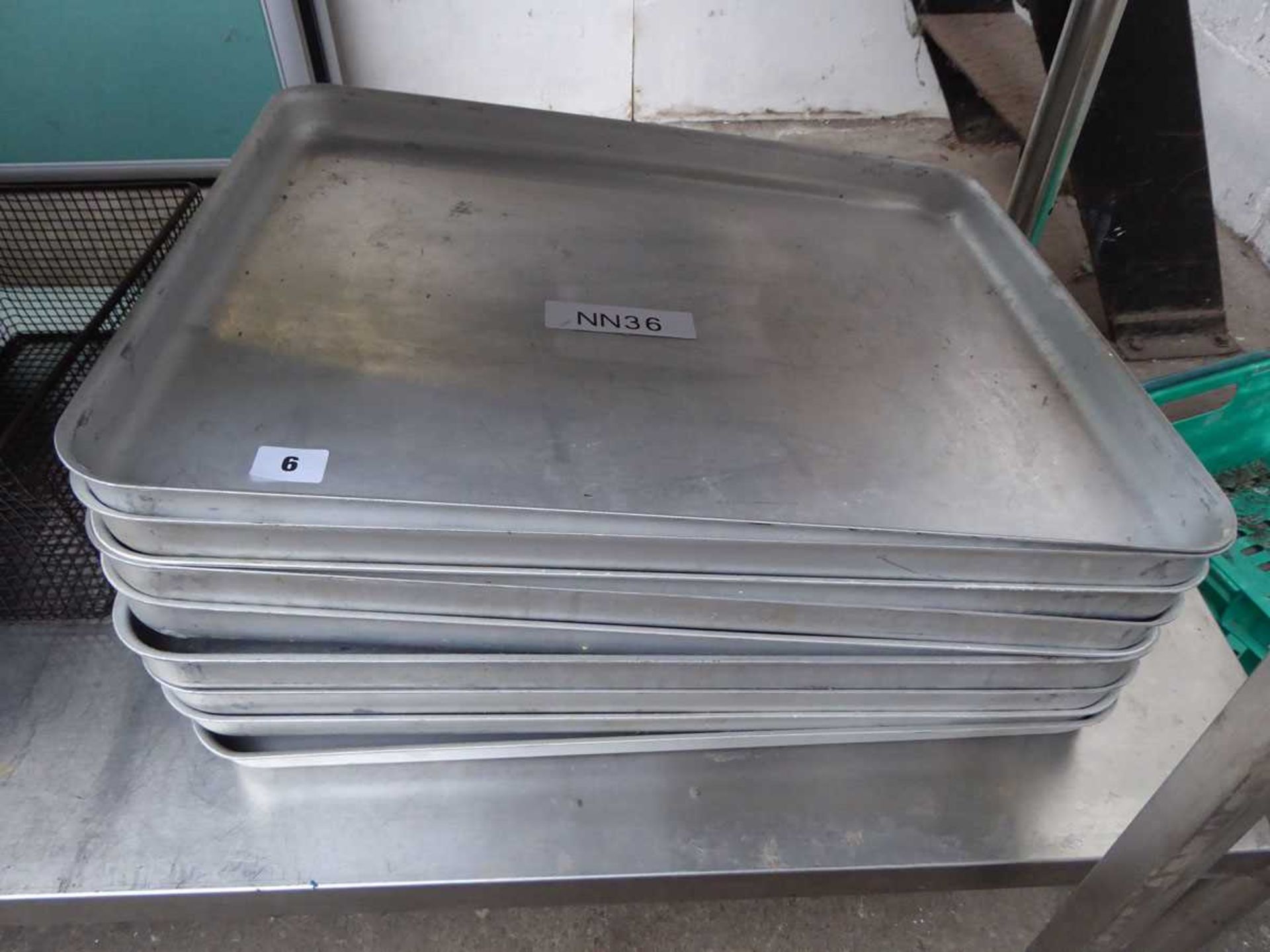 Stack of 9 large aluminium oven trays