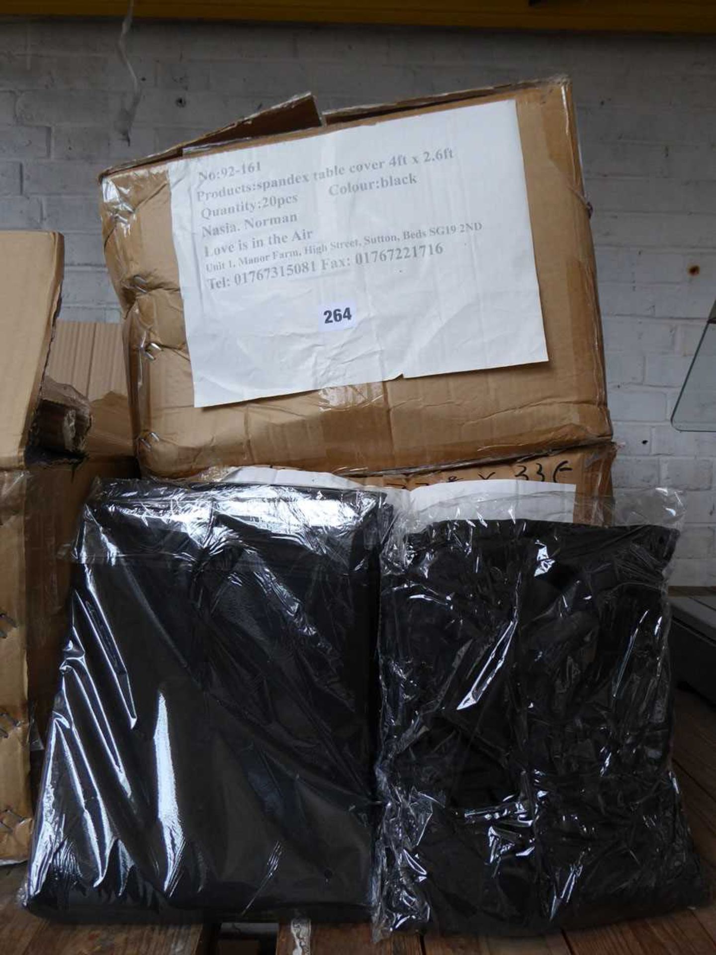 2 x boxes containing a large quantity of mostly black table cloths in assorted sizes