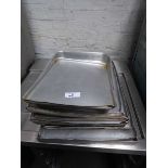 +VAT Stack of aluminium oven trays