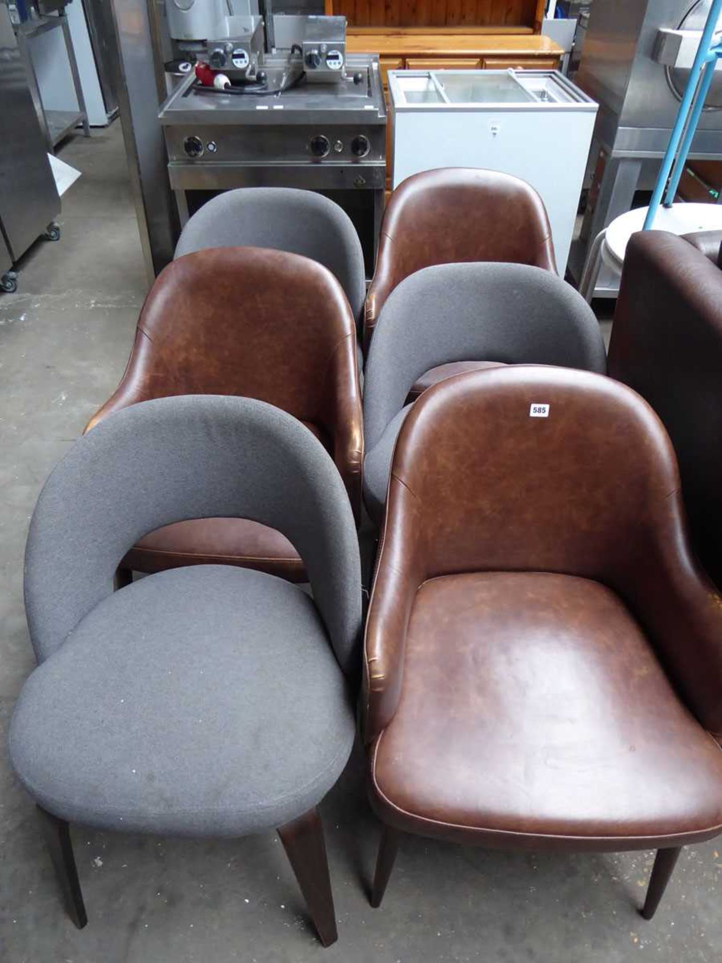3 matching brown vinyl leather effect tub chairs and 3 grey cloth tub chairs
