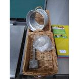 4 wicker baskets plus a stack of aluminium plate rings, a meat tenderiser and some ashtrays