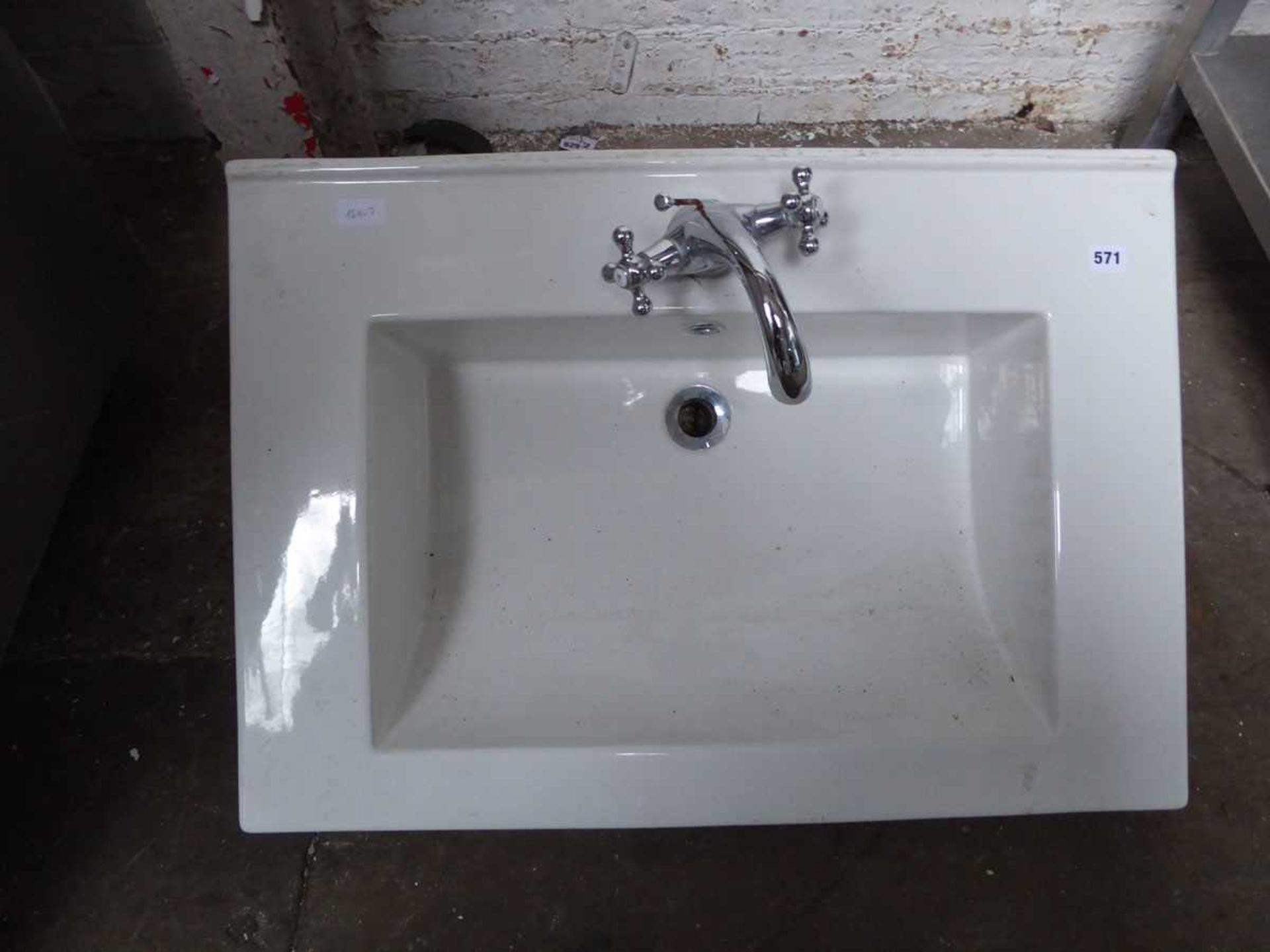 Ceramic sink with tap set