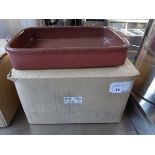 Box containing 4 large rectangular oven dishes