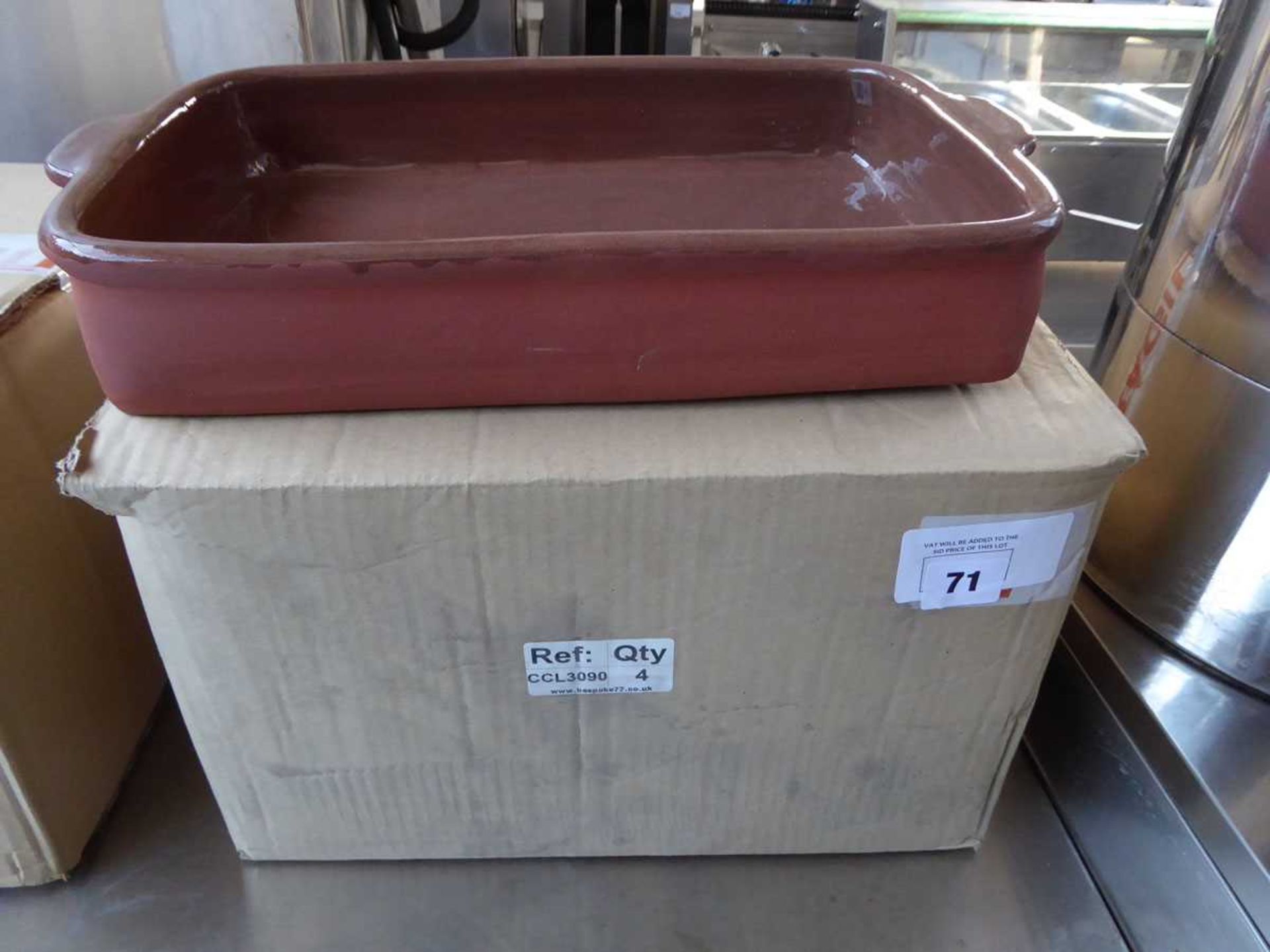 Box containing 4 large rectangular oven dishes