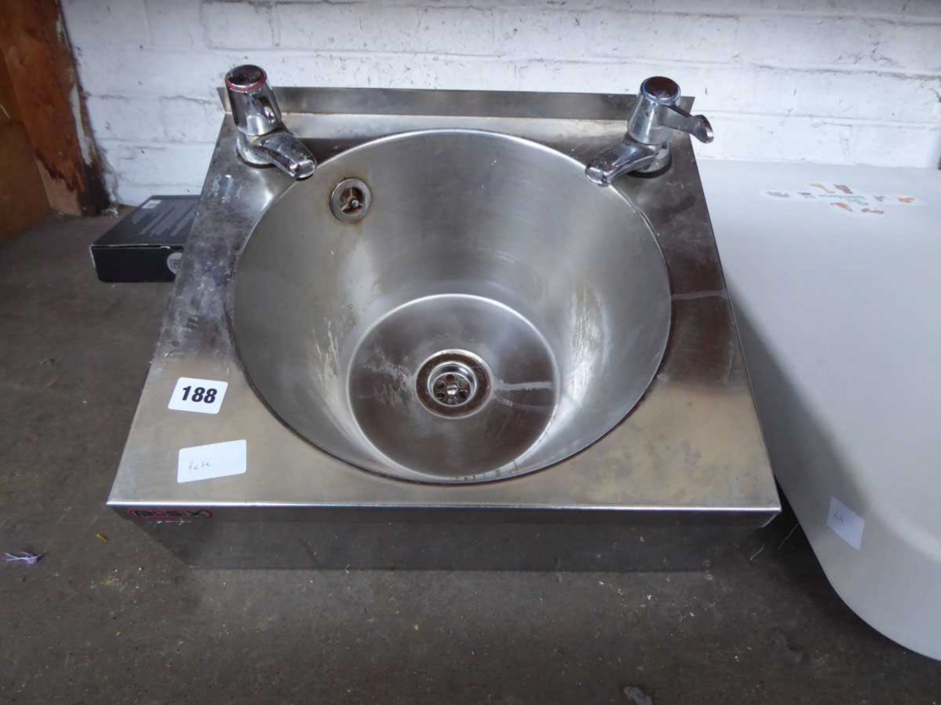 Stainless steel wall mounted hand basin with taps
