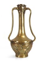 An Art Nouveau three-handled brass vase with leaf decoration, in the Japanese manner, h. 31 cm *