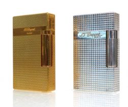 A French gilt metal lighter by Dupont, together with a silvered example by the same manufacturer (2)