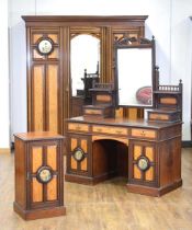 A late 19th century walnut, satinwood and ebony strung three-piece bedroom suite in the Aesthetic