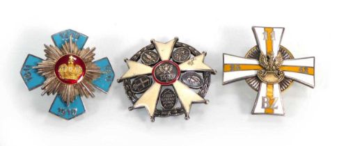 A group of three Polish regimental enamelled badges including The 24th Uhlan Regiment, 42 Pulk