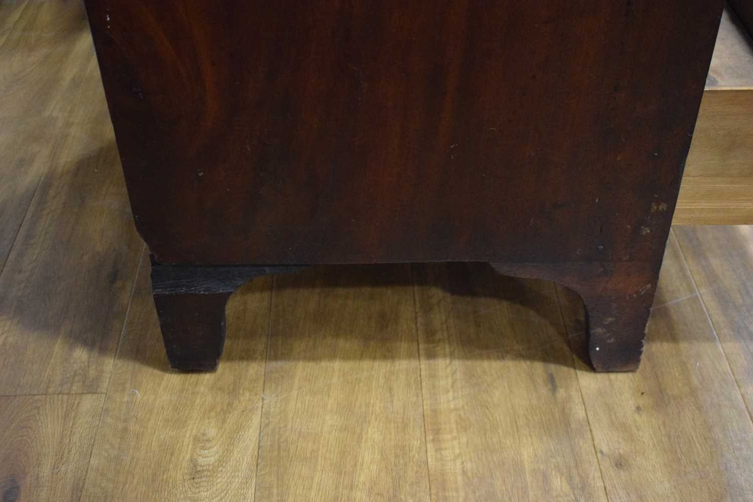 A Georgian mahogany chest of four long graduated drawers, marquetry work to the frieze, on bracket - Image 8 of 13