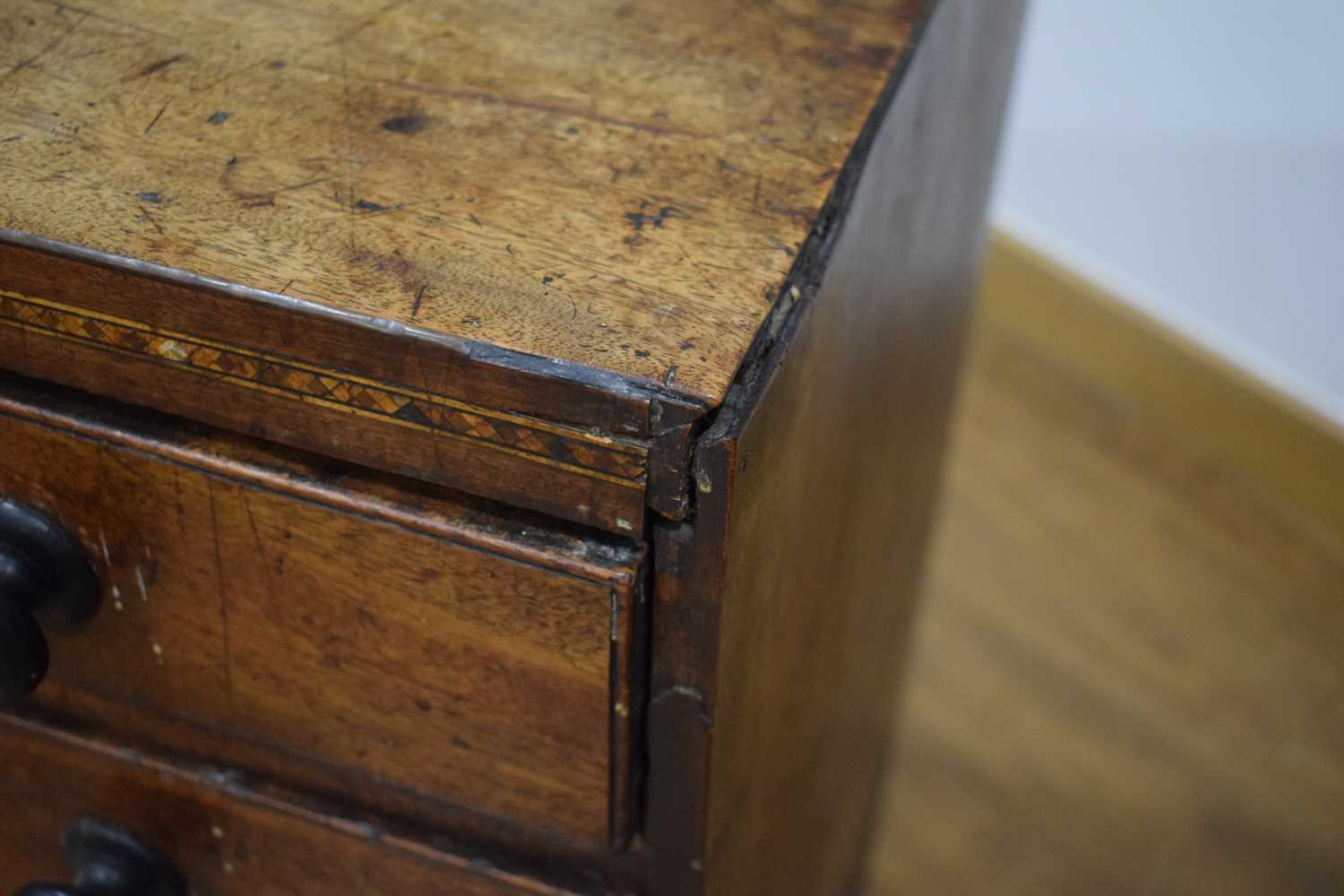 A Georgian mahogany chest of four long graduated drawers, marquetry work to the frieze, on bracket - Image 6 of 13