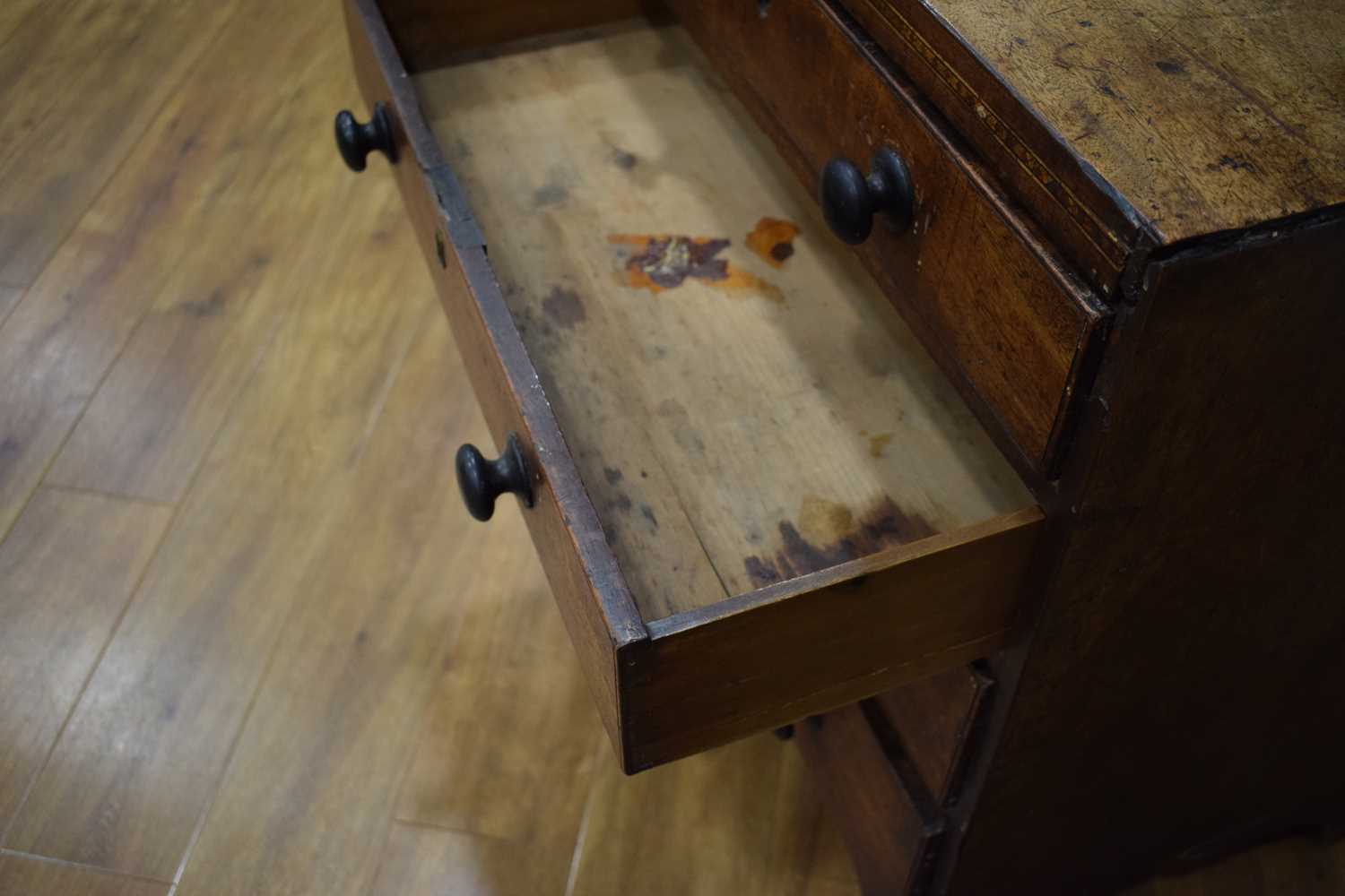 A Georgian mahogany chest of four long graduated drawers, marquetry work to the frieze, on bracket - Image 10 of 13