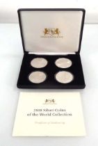 A set of four Harrington & Byrne silver coins commemorating Britannia, America, Australia and