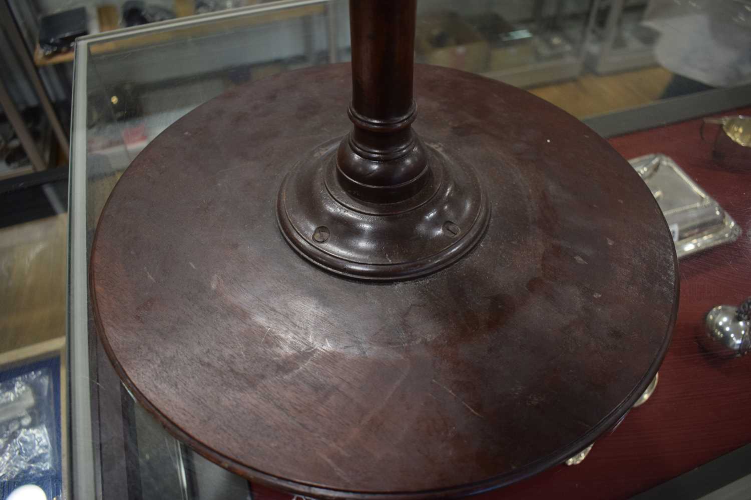 A 19th century mahogany wine table, the circular surface on a turned column and tripod legs, di. - Image 3 of 9