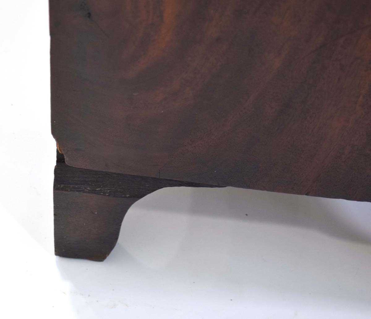 A Georgian mahogany chest of four long graduated drawers, marquetry work to the frieze, on bracket - Image 5 of 13