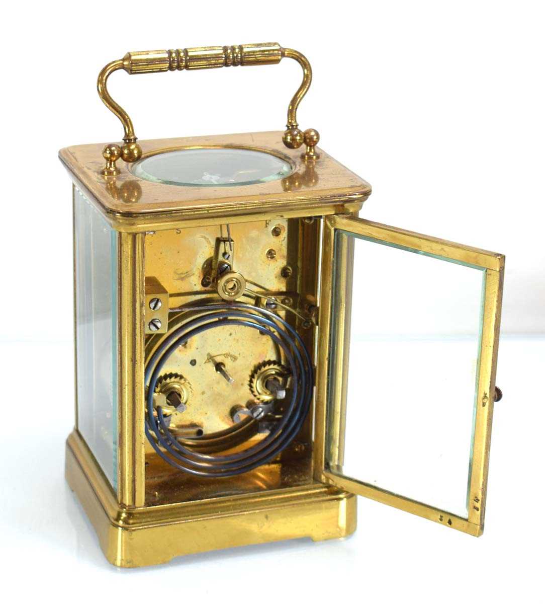 A late 19th/early 20th century carriage clock, the movement striking on a gong, within a brass and - Image 2 of 2
