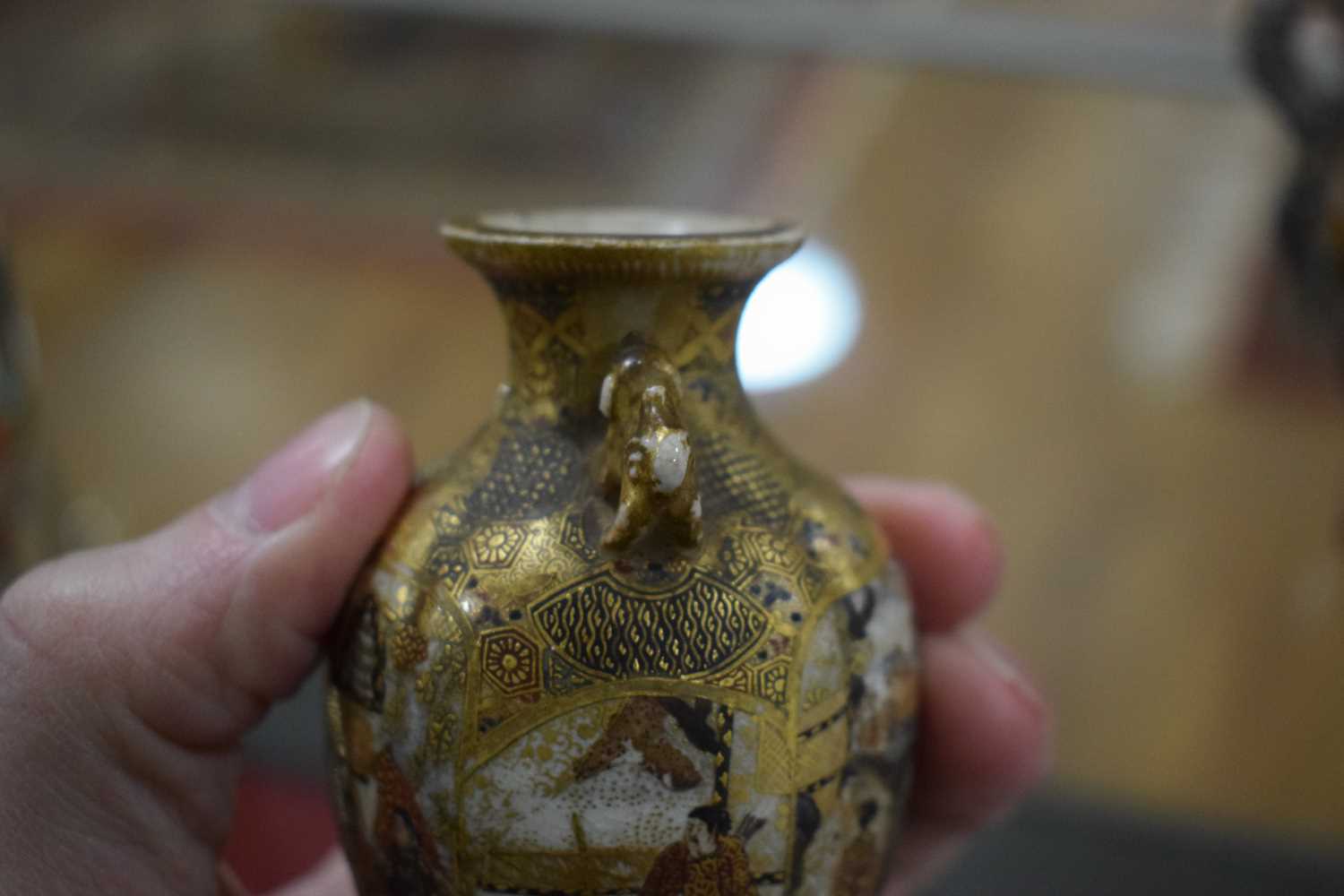 A pair of satsuma vases of squared baluster form, each decorated with traditional figures at - Image 38 of 44