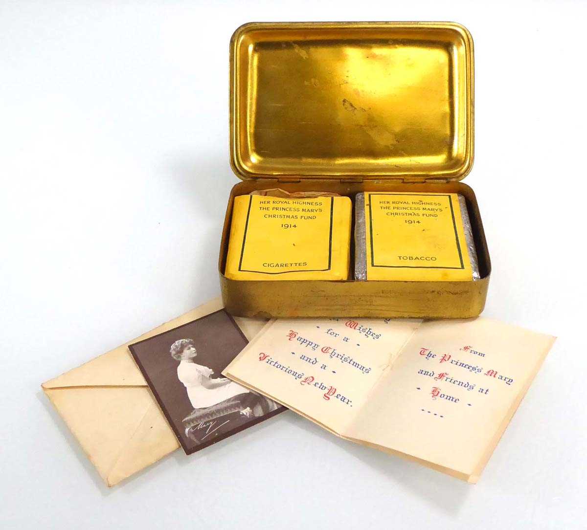 A First World War 1914 Christmas Tin containing tobacco, cigarettes and Queen Mary's message Eight - Image 3 of 4