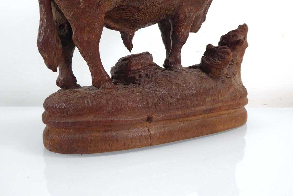 A late 19th/early 20th century 'Black Forest' carving modelled as a bull on a naturalistic plinth, - Image 3 of 7