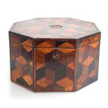 An early 19th century specimen box of octagonal form, inlaid with yew, walnut, rosewood etc., di. 28