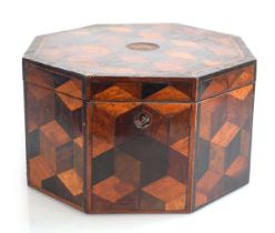 An early 19th century specimen box of octagonal form, inlaid with yew, walnut, rosewood etc., di. 28