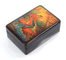 A Russian black lacquered box decorated with a scene from the Frog Princess, 9 x 6 x 3 cm