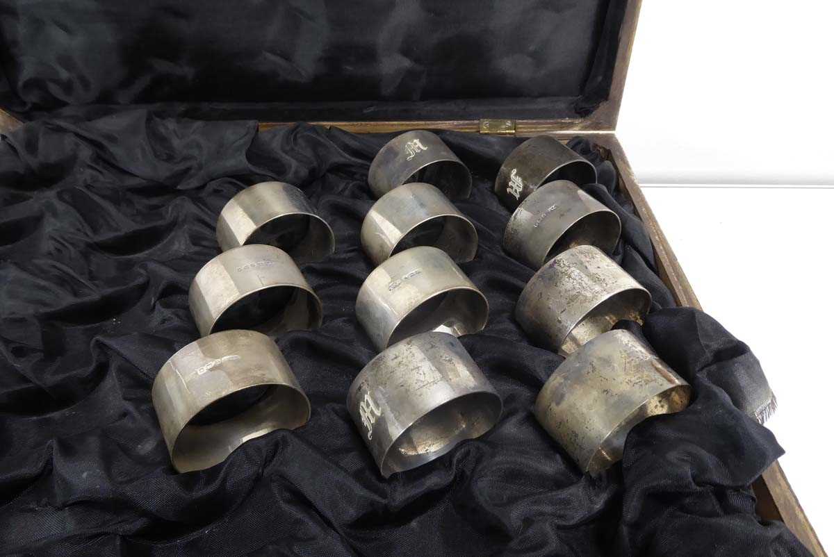 A set of eleven silver napkin rings, London 1938, overall 9.3 ozs, housed in a case for twenty- - Image 3 of 3