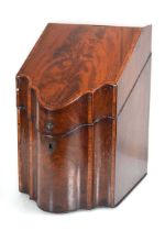 An early 19th century mahogany and crossbanded knife box of serpentine form h, 37 cm