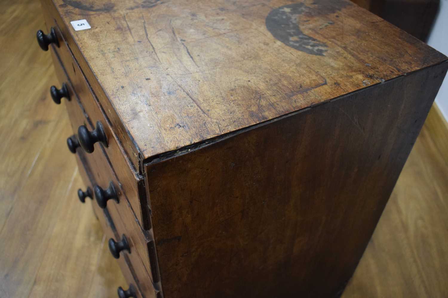 A Georgian mahogany chest of four long graduated drawers, marquetry work to the frieze, on bracket - Image 12 of 13