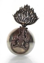 A Polish silver table lighter of grenade form, relief decorated with an eagle, (?)Francis