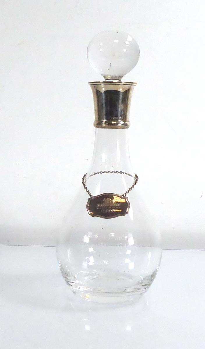 A modern silver mounted decanter and stopper, Sheffield 2003, h. 30.5 cm, together with a plated