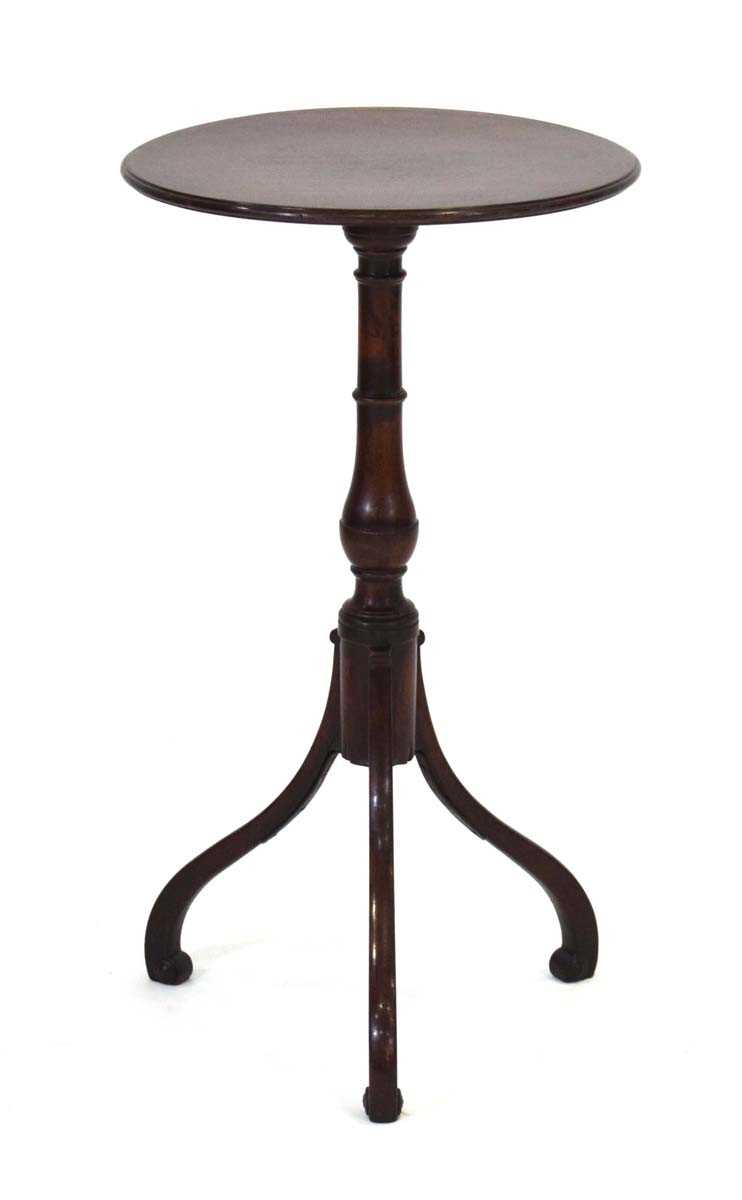 A 19th century mahogany wine table, the circular surface on a turned column and tripod legs, di.