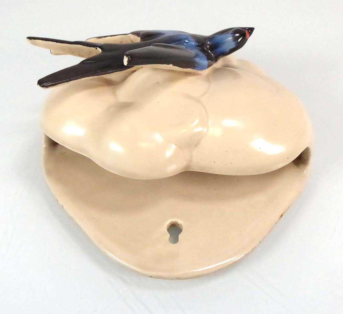 Clarice Cliff for Newport Pottery, a wall pocket relief decorated with a swallow, l. 19 cm No - Image 2 of 2