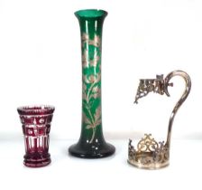 A Bohemian ruby glass beaker, h. 15 cm, a green and gilt decorated glass vase and a silver plated