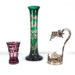 A Bohemian ruby glass beaker, h. 15 cm, a green and gilt decorated glass vase and a silver plated