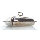 An early 20th century silver entrée dish and cover of cushioned rectangular form with shell and leaf