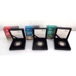 Three Royal Mint Tales of the Earth Dinosaur Collection silver 50p coins, all cased (3)