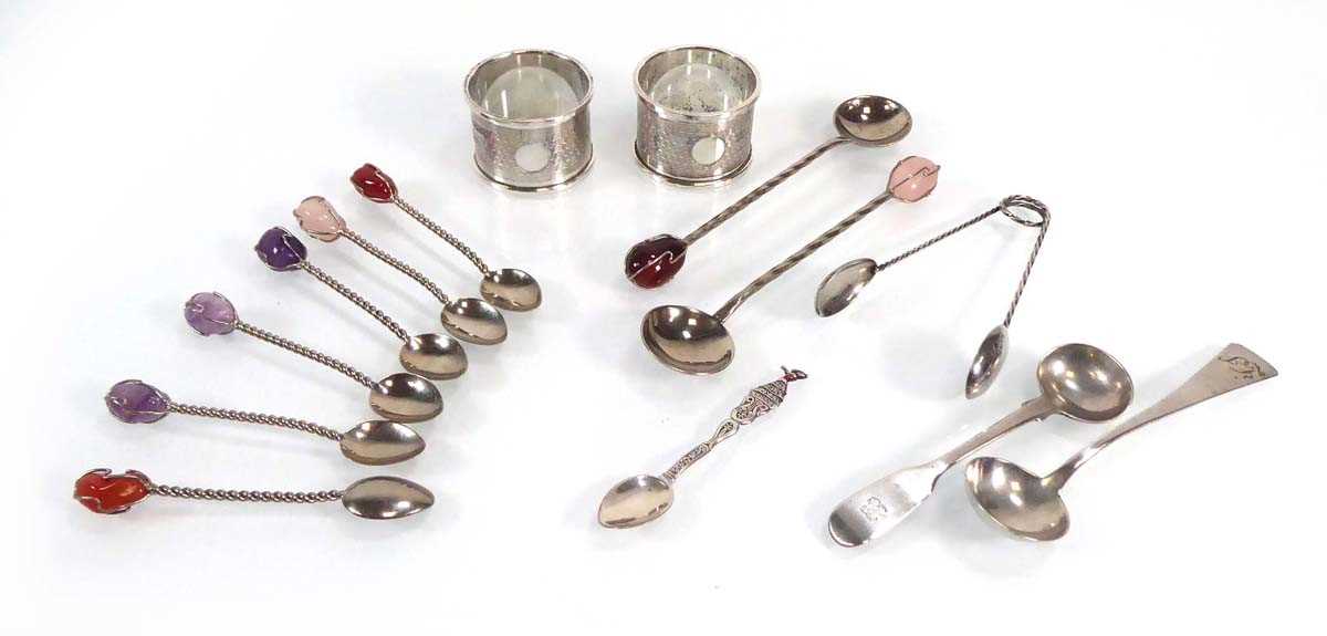 A group of silver and metalwares comprising a pair of engine turned napkin rings, quartz end