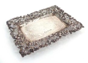 A Victorian silver card tray with thistle, clover leaf and foliate border, maker JW, Birmingham