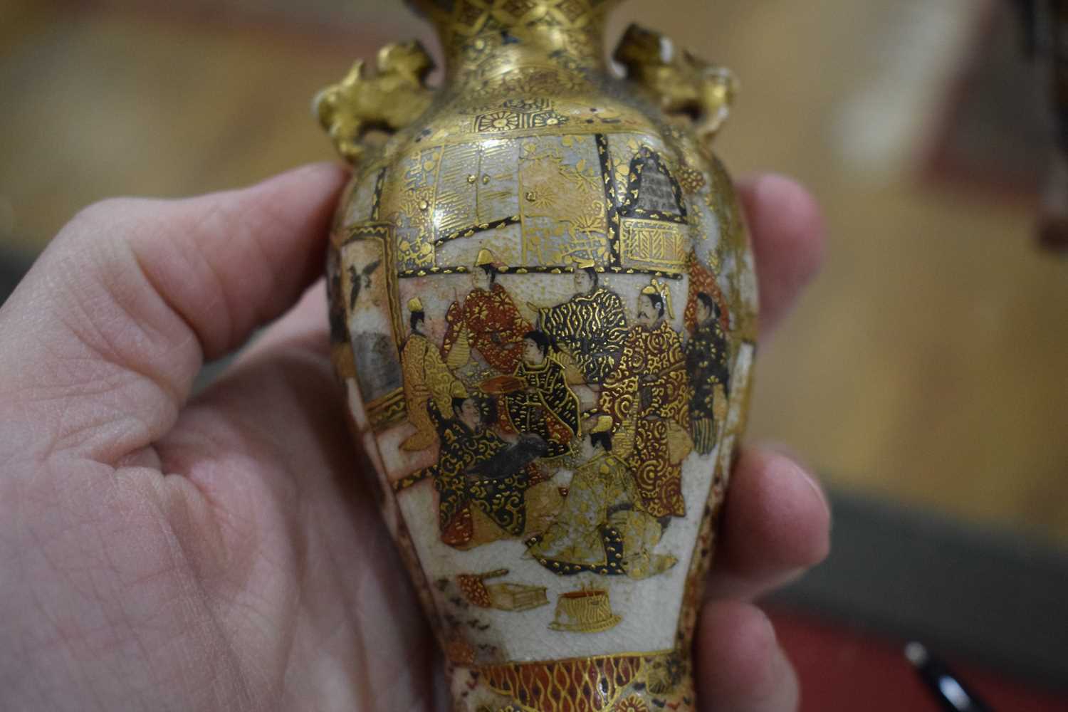 A pair of satsuma vases of squared baluster form, each decorated with traditional figures at - Image 35 of 44