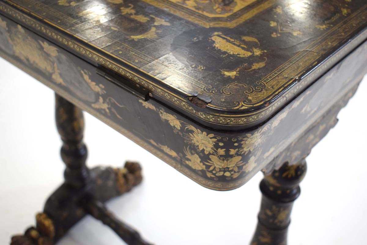 A mid-19th century black lacquered and gilt sewing table intricately decorated in the chinoiserie - Image 11 of 14