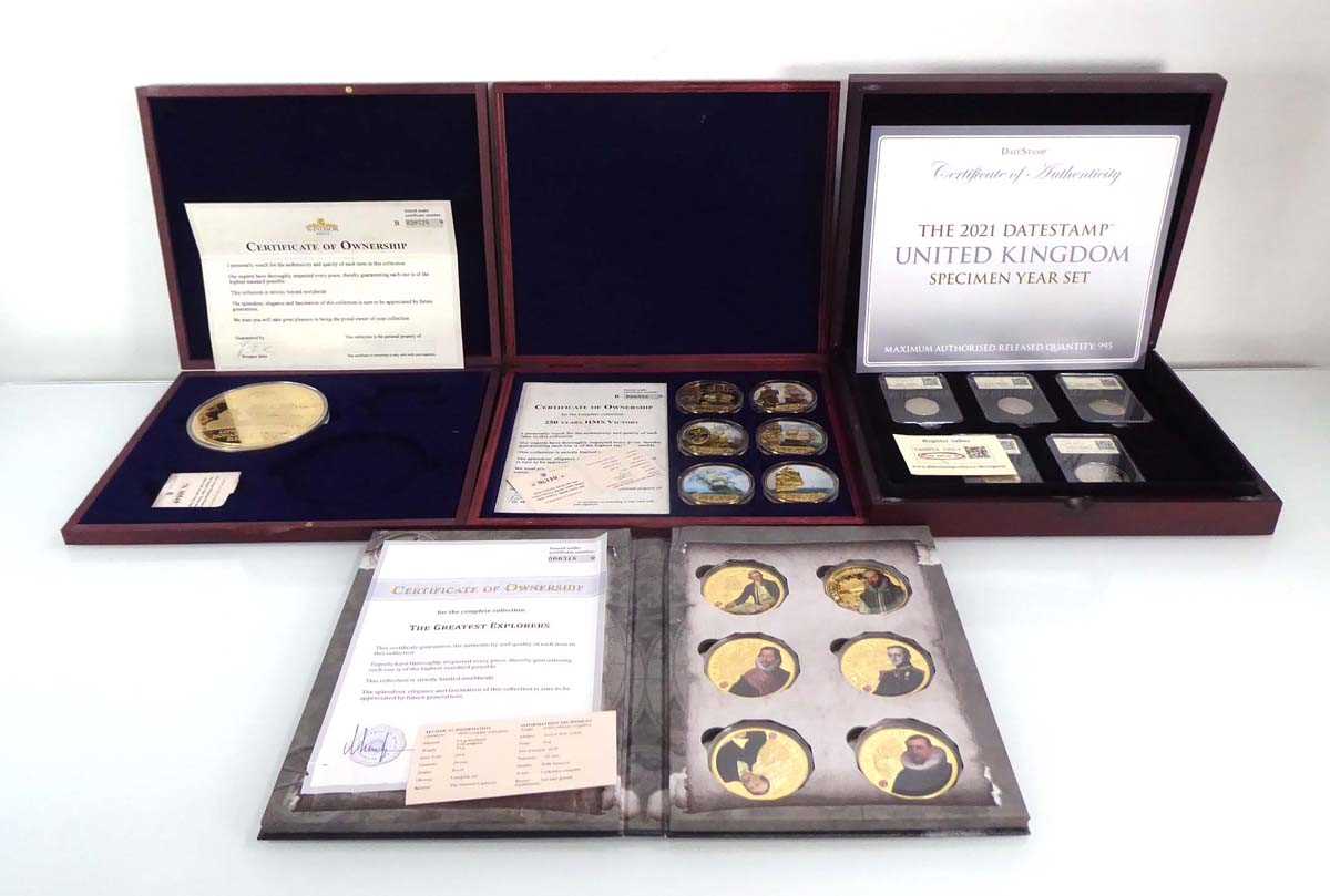 A set of five Datestamp Specimen Year set coins for 2021, a large gilt metal medallion commemorating